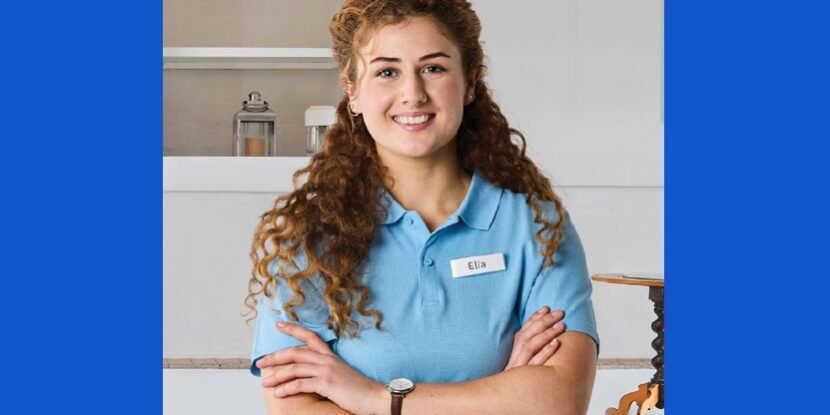 MEGT – School-Based Apprenticeshipsggkjhk young woman, named Elia, smiling with arms crossed